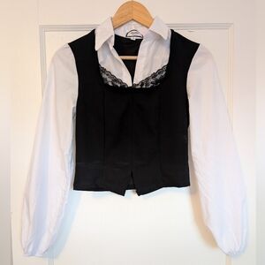 Discreet New York City white and black lace trimmed top